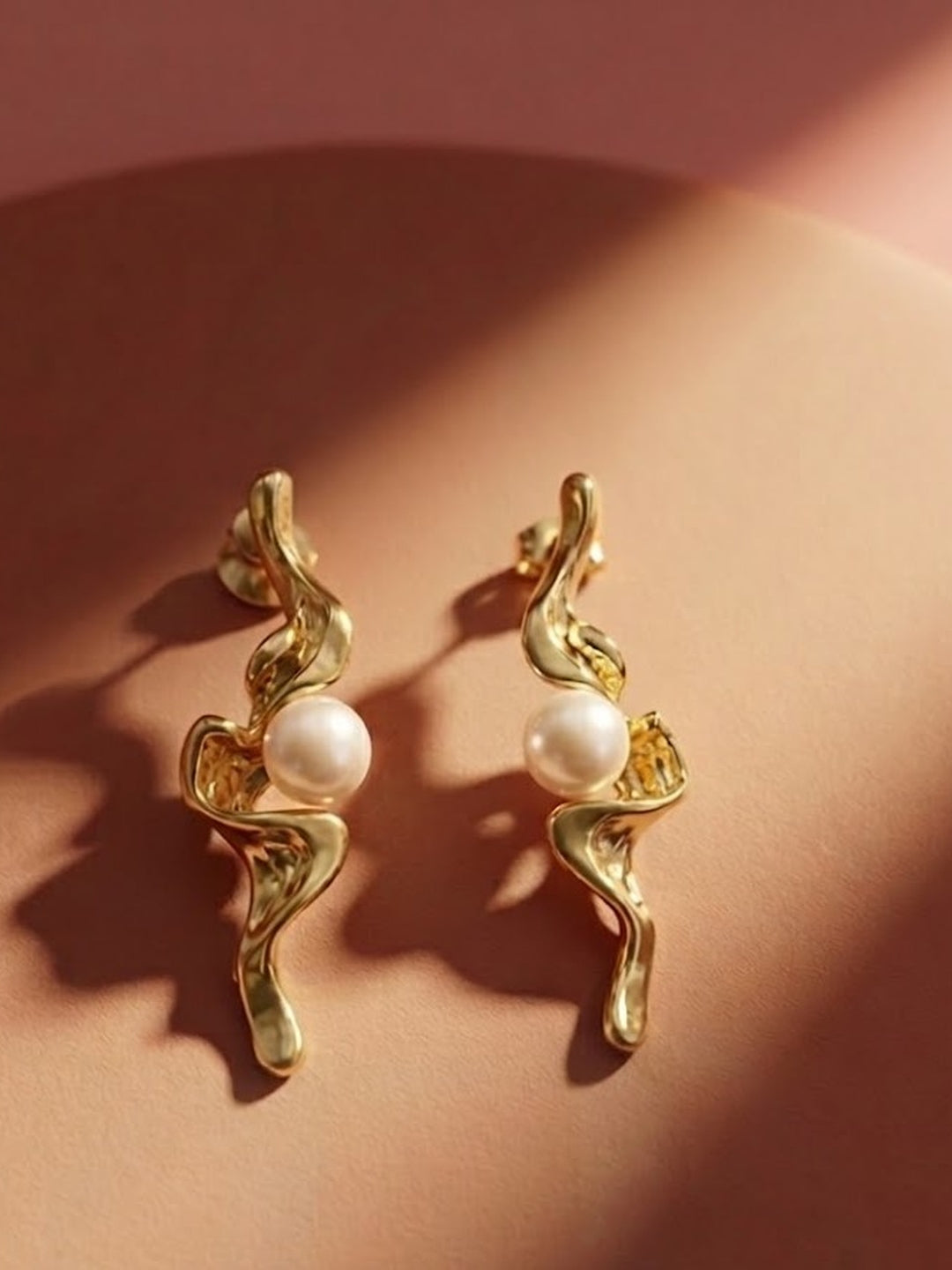 Twisted Gold pearl Statement Earrings