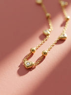 Golden love charm necklace