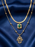 Golden emerald hamsa layered necklace