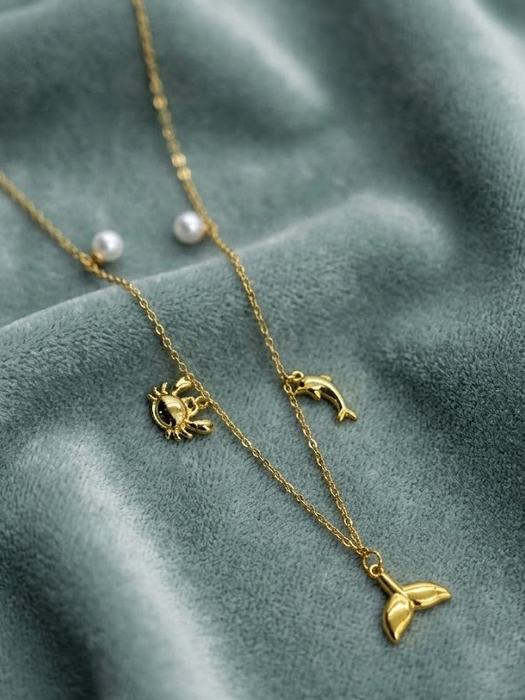 Golden sea charm necklace