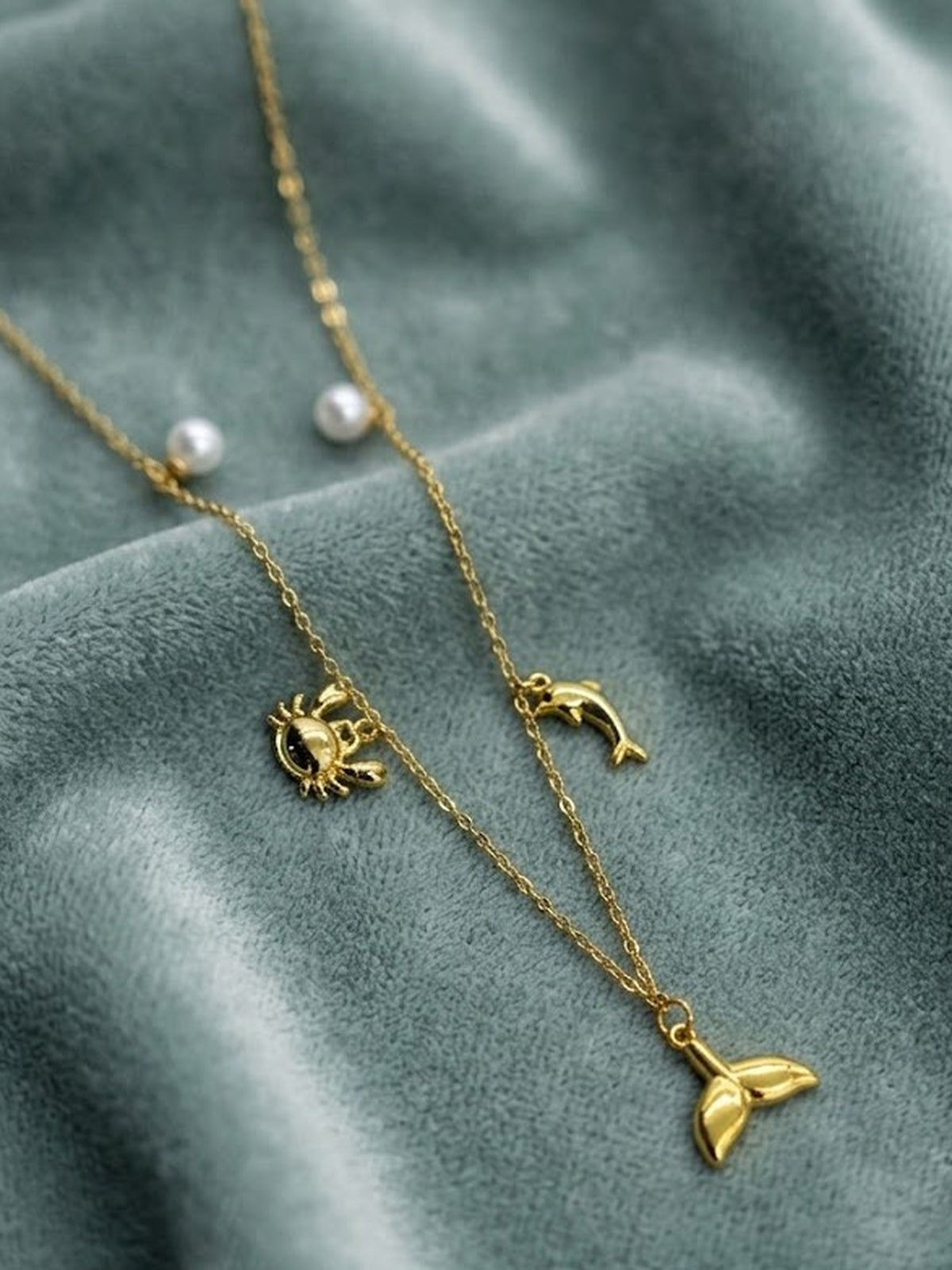 Golden sea charm necklace