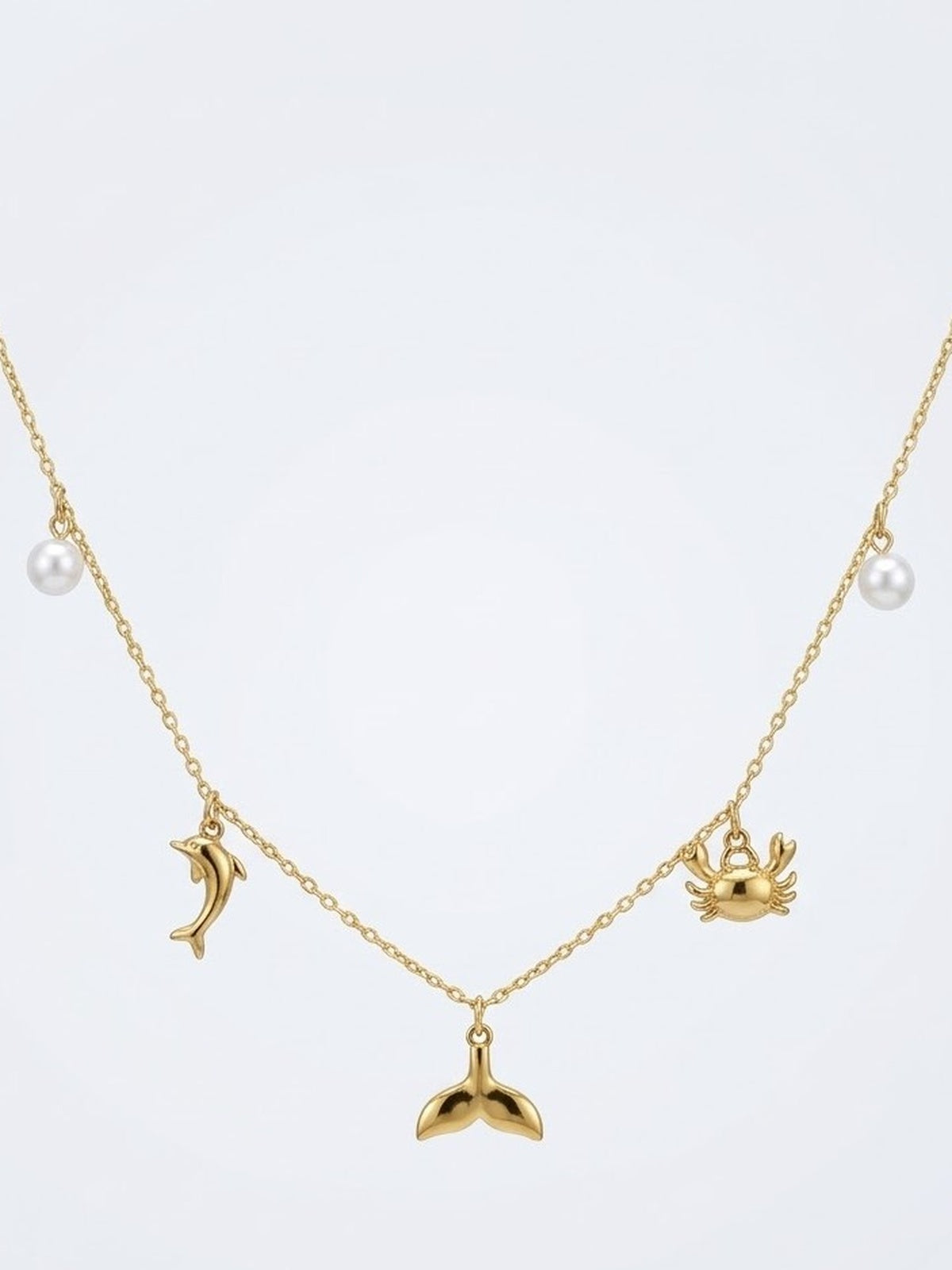 Golden sea charm necklace