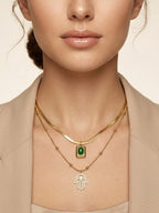 Golden emerald hamsa layered necklace