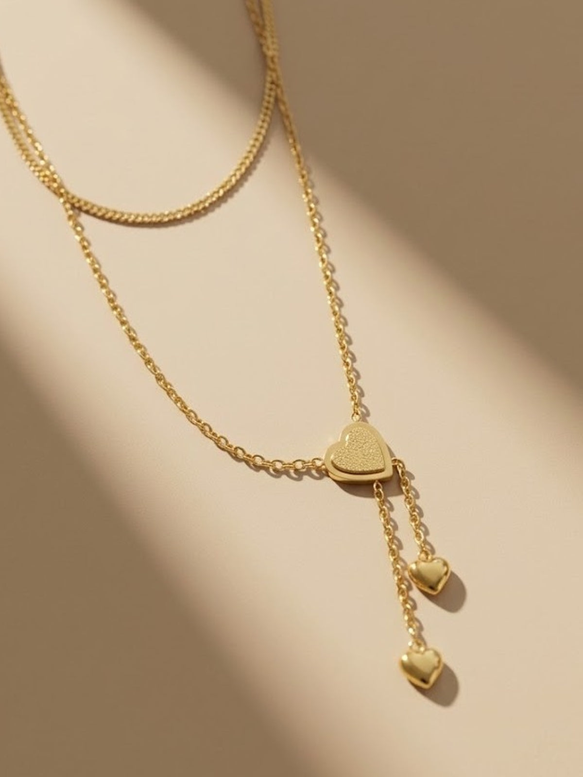 Double layered golden heart necklace