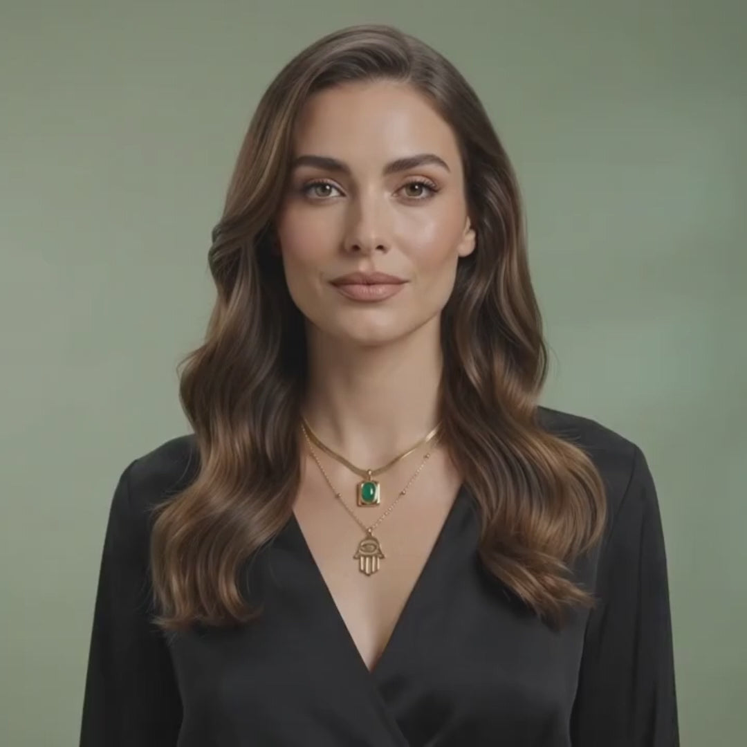 Golden emerald hamsa layered necklace